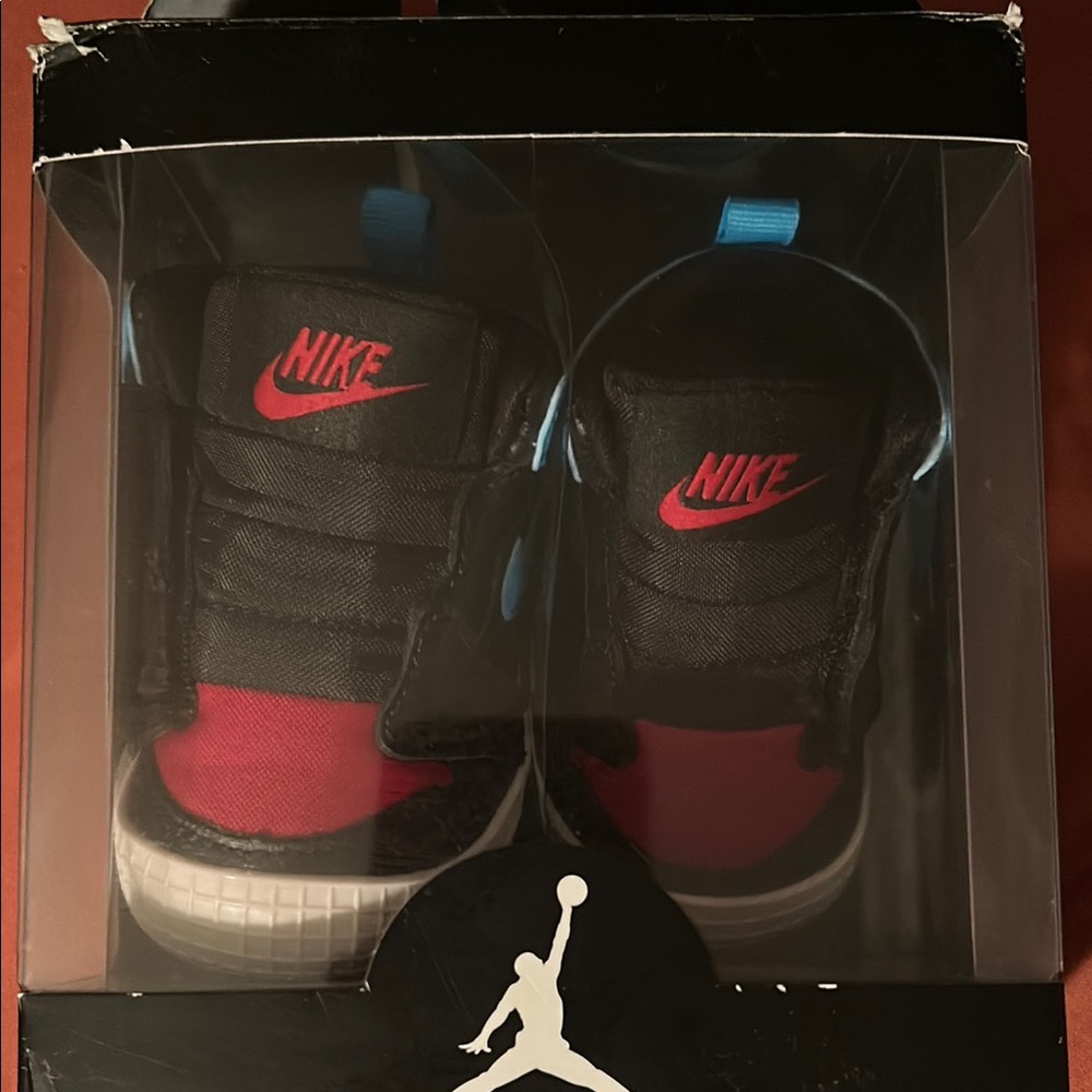 Nike Kids Black and Red Sneakers with Blue Accents